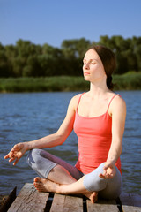Fototapeta na wymiar Woman practicing yoga