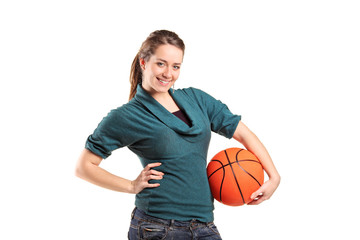 Young girl holding a basketball