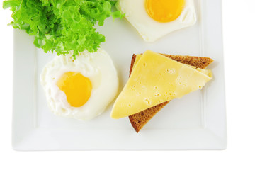 green lettuce and fried eggs