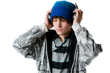 teen boy listening to music on headphones
