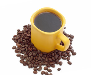 A cup of coffee and coffee beans