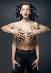 Naklejka premium Young woman with beautiful long curly hair.