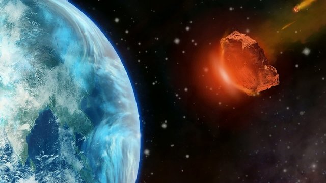 Asteroid with tail of fire flying between planets in space