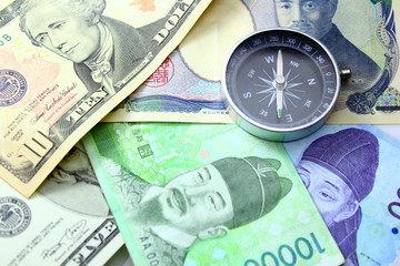 dollar korean won japannesse yen with compass right side