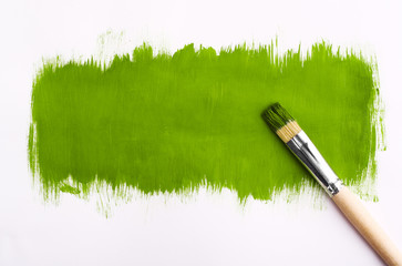 Brush for paint. On gray background