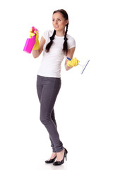 Young woman with spray bottle and brush