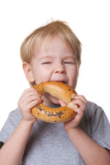 boy eats a bagel