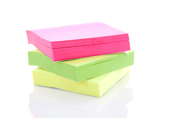 pile of colorful sticky paper over white background