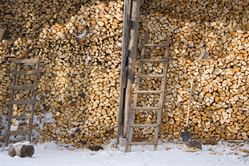 Huge firewood piles, winter time, Northern Russia
