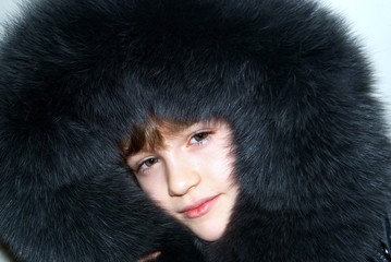 The girl in a hood from fur