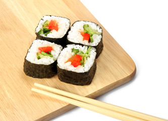 Maki sushi. Japanese cuisine on white