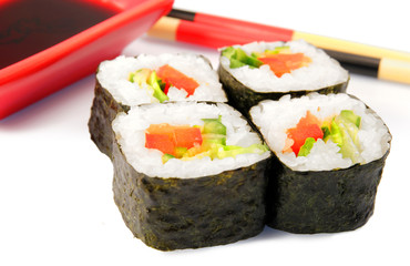 Maki sushi. Japanese cuisine on white