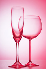 Wine glasses against gradient background