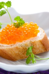 Party snack with red caviar