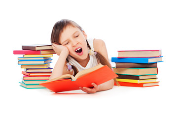 drowsy little girl with books