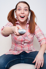 woman swapping the TV channels