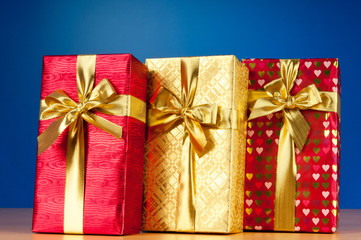 Celebration concept - Gift box against colorful background