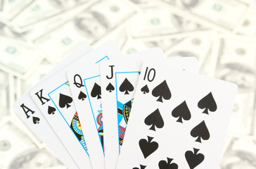 Cards on money background close up