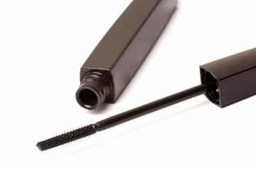 Black mascara wand and tube