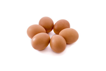 Six eggs on the white background