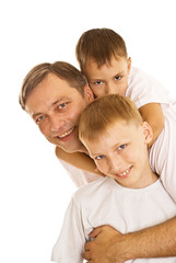 young father with his two sons standing