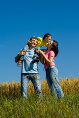 family of three on the nature