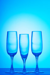 Wine glasses against gradient background