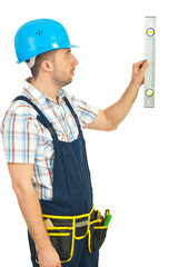 Worker holding construction bubble level