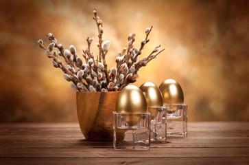 Three golden eggs and blossom tree
