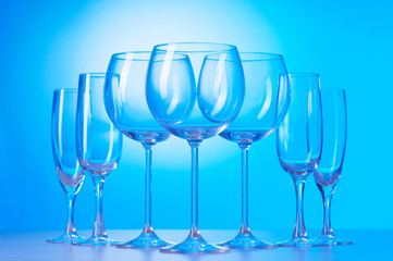 Wine glasses against gradient background