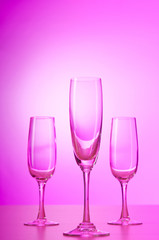 Wine glasses against gradient background