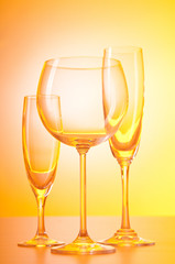 Wine glasses against gradient background