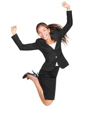 Celebrating businesswoman jumping
