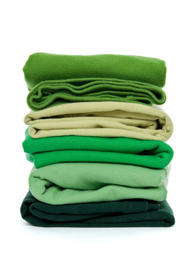 Pile Of Green Folded Clothes