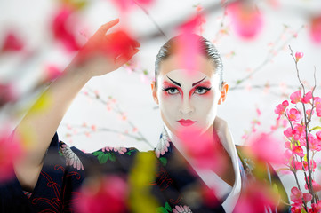 Artistic portrait of japan geisha woman with creative make-up ne