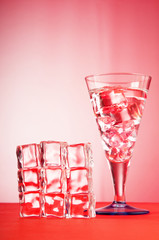 Water in the glass against gradient background