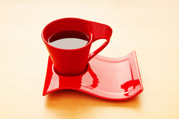 Cup of tea on the wooden background