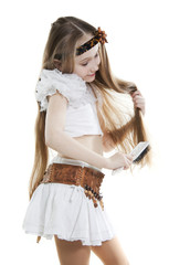 Girl blonde combs long hair