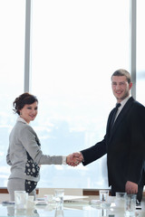 business man and woman handshake on  meeting