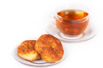 Homemade curd pancake close and a cap of tea