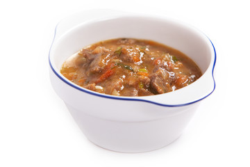 Meat stew with vegetables and herbs