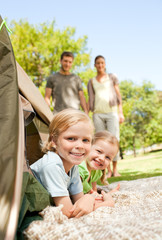 Naklejka premium Happy family camping in the park