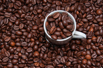 Overhead shot of cup and coffee beans