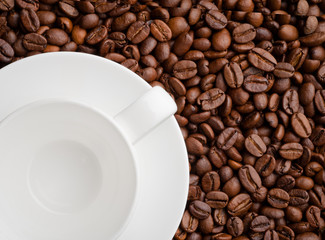 studio shot of a cup of coffee beans.