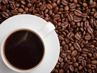 studio shot of a cup of coffee beans.