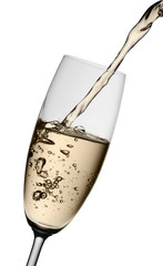 Champagne being poured into glass, isolated on a white backgroun