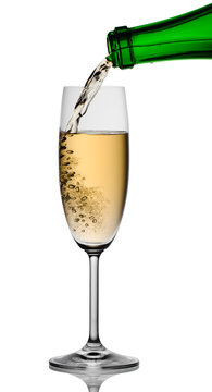 Champagne being poured into glass, isolated on a white backgroun