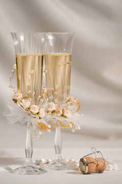 Two wedding glasses with champagne