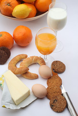 Breakfast with juice, fruits and eggs