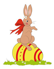 Häschen sitzt auf gelbes Ei